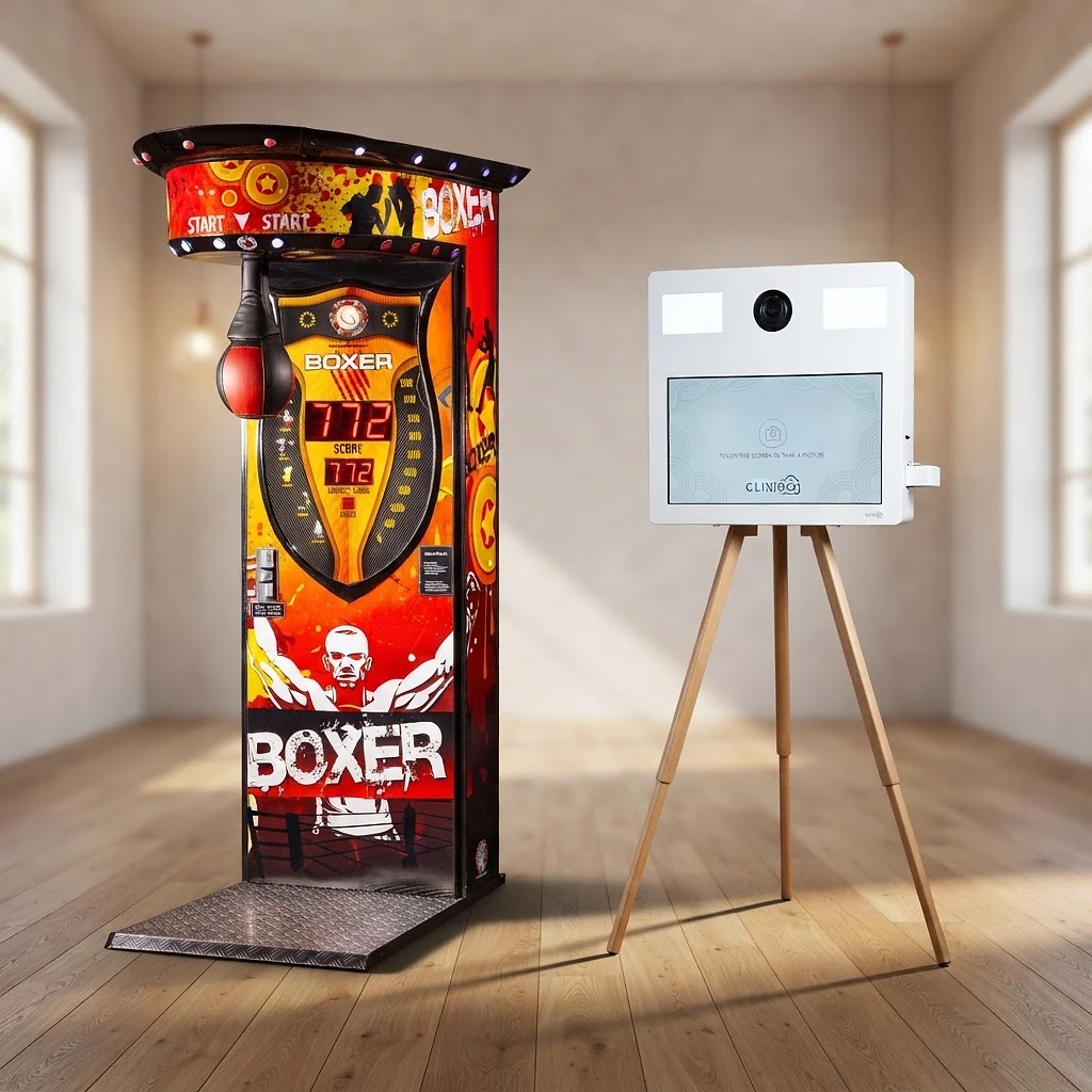 De Boxer boksbalmachine en photobooth naast elkaar in één feestlocatie